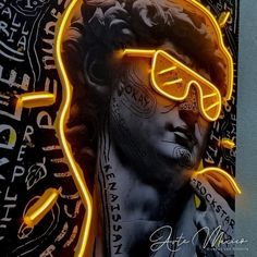 a neon sign with a woman's face and glasses lit up in the dark