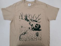 hand-printed t-shirt with original art based on photos t-shirt: B&C #E190              sand color,              crew neck              short sleeve              100% cotton,               185 g/m²              ring-spun              pre-shrunk               All items are posted with the Hellenic post service (ELTA) estimated arrival time : Greece 3-7 days, EU: 7-15 days, non-EU: 10-30 days B + C, Color Crew, Art Base, Sand Color, Hand Print, Tree Print, Retro Outfits, Cool Fabric, Tshirt Colors