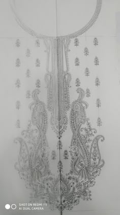 the back side of an embroidered dress