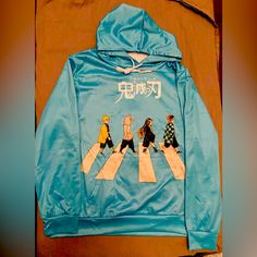 Adult Size Small Nwot Anime Hoodie Blue Hooded Top For Streetwear, Light Blue Crew Neck Casual Outerwear, Blue Hooded Winter Sweater, Blue Winter Hoodie With Graphic Print, Blue Hooded Sweater For Streetwear, Blue Sweater With Drawstring Hood For Streetwear, Blue Hooded Top For Winter, Blue Hooded Winter Top, Blue Hooded Sweater For Fall