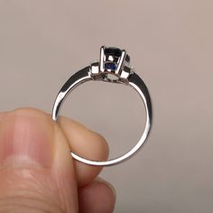 This is a gorgeous handmade creation. Its beauty is its simplicity & Elegance. The 6*8mm oval cut lab sapphire is crafted in solid sterling silver and with rhodium plated. It's made to order and it will take about 7 days to make it. All item is sent in a beautiful gift box You can realize more lovely stuff clicking the link https://www.etsy.com/shop/knightjewelry?refshopsection_shophome_leftnav Please leave the correct address and you phone number for delivering successfully. Oval Sapphire Promise Ring, White Gold Oval Sapphire Ring, Fine Jewelry Oval Lab-created Sapphire Ring, Oval Sapphire Promise Ring In 14k White Gold, Sapphire Sterling Silver Ring For Proposal, Oval Lab-created Sapphire Ring, Classic Oval Sapphire Birthstone Ring, Silver Oval Sapphire Birthstone Ring, Oval Sapphire Birthstone Ring