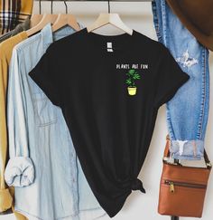 White shirt with a cannabis plant saying plants are fun - HighCiti Fun Shirt, Cool Shirts, Solid Colors, Graphic Tee, Spun Cotton, Care Instructions, Graphic Tees, Eco Friendly, Solid Color