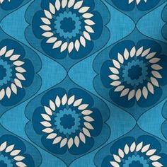 a blue and white flower pattern on fabric