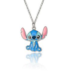 Step into the magical world of Disney with this enchanting Lilo and Stitch Fashion Stitch Necklace & Earrings Set. Perfect for fans of the beloved blue alien, this set features a charming Stitch pendant necklace paired with matching earrings, designed to add a playful touch to any ensemble.

- Brand: Disney
- Product Type: Jewelry Set
- Includes: Pendant necklace and matching earrings
- Theme: Stitch from Lilo and Stitch
- Age Group: Adult
- Gender: Female

Ideal for everyday wear or as a unique Adjustable Jewelry With Cute Design Gift, Cute Nickel-free Pendant Jewelry, Whimsical Jewelry With Cute Design For Gifts, Personalized Disney Silver Jewelry, Themed Silver Jewelry For Disney Fan Events, Personalized Themed Blue Jewelry, Disney Personalized Necklaces For Gifts, Disney Style Sterling Silver Jewelry Gift, Whimsical Blue Pendant Jewelry