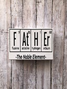 a wooden sign that says father the noble element