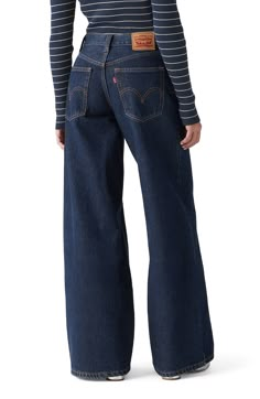 A dramatic baggy fit brings '90s vibes to these mid-rise wide-leg jeans constructed from cotton nonstretch denim. Zip fly with button closure Five-pocket style 100% cotton Machine wash, tumble dry Imported Levis Wide Leg Jeans, Dark Wash Baggy Jeans, Baggy Wide Leg Jeans, 90s Jeans, Denim Day, Dark Denim Jeans, Law Student, Levi Jeans Women, Dark Wash Jeans