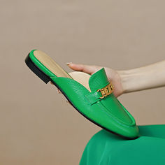 Handmade from premium leather. these loafer mules are really comfortable and breathable. Boasting chain decoration. these green mules help you show an easy chic look. Upper: Genuine Leather Lining: Genuine Leather Outsole: TPR Toe: Round Toe Closure: Slip on Color: White. Royal Blue. White is_handmade: Yes Elegant Green Slip-on Mules, Green Leather Loafers For Summer, Green Slip-on Mules, Chic Green Mules With Flat Heel, Chic Green Slip-on Mules, Chic Green Loafers For Spring, Chic Green Closed Toe Mules, Chic Green Leather Mules, Trendy Green Leather Mules