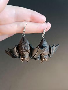 Bat Earrings handmade polymer clay, Halloween Earrings, Halloween jewelry.  If you  If you're looking for a unique and unusual earrings, then you're in the right place!  This delightful Bat earrings would make a wonderful a lovely treat for friend, sister, girl, mom, and yourself! BAT earrings are very lightweight and won't feel heavy on your earlobe, ensuring all-day comfort.  The earring hooks are made from nickel-free and lead-free metal, making them safe and comfortable for sensitive ears. Black Earrings For Halloween Cosplay, Black Halloween Cosplay Earrings, Handmade Polymer Clay Halloween Jewelry, Handmade Resin Jewelry For Halloween, Halloween Cosplay Earrings, Handmade Black Novelty Earrings, Handmade Black Vampire Earrings, Handmade Halloween Costume Earrings, Clay Halloween Earrings