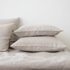 three pillows stacked on top of each other