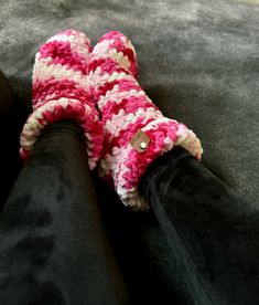 Keep your feet warm and cozy with these fuzzy pink slippers. Made from soft and comfy material, these socks are perfect for lounging around the house or keeping your toes toasty on a chilly day. Snug Super Soft Pink Socks, Comfy Warm Pink Socks, Pink Comfortable Winter Slippers, Comfortable Pink Winter Slippers, Cozy Warm Pink Socks, Super Soft Pink Socks For Indoor Use, Pink Cute Slippers With Super Soft Details, Comfy Snug Pink Socks, Cute Pink Super Soft Slippers