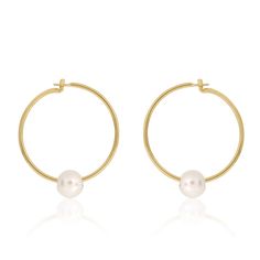 We’re picky about our pearls. Our collection of modern-feel pearl pieces takes your grandmother's favorites and incorporates them into the latest trends, interpreted from our NYC-gal perspective.These gem-quality pearls are natural freshwater beauties, set in solid 14k gold that won't tarnish or ... Timeless Everyday Elegance Hoop Earrings, Timeless Round Hoop Earrings For Everyday Elegance, Everyday Elegant Round Hoop Earrings, Modern Everyday Pearl Earrings, Modern Jewelry With Pearl Charm, Minimalist Formal Hoop Earrings With Pearl Drop, Formal Minimalist Hoop Earrings With Pearl Drop, Modern Hoop Earrings With Pearl Charm, Modern Everyday Earrings With Pearl Charm