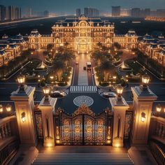 an aerial view of the entrance to a palace at night