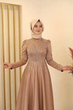 The dress is made of satin fabric. It is suitable for use in 4 seasons. It's a full fit dress. It is unlined. Dress length is 150 cm. The length of the model is 172 cm and the body is 38. Islamic Long Dress, Tile Dress Hijab, Pregnant Dress Hijab, Eid Long Sleeve Niqab With Modesty Panel, Evening Satin Maxi-length Abaya, Mink Colour, Islamic Dress, Islamic Clothing, Hijab Dress