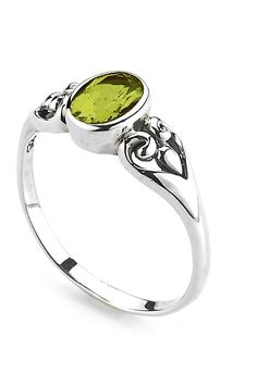 Sterling silver oval peridot ring. Approx. 5/16" L X 1/4" W. ImportedOrders cannot be shipped to Canada, Puerto Rico, APO, FPO or P.O. Boxes.