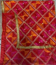 Mothers day gift orange pink colour Phulkari Dupatta for women | Phulkari also called Indian Dupatta | Used as Dupatta Stole  Phulkari is traditional artwork of Embroidery indigenous to Punjab region of India. Punjabi women traditionally created it with hand over many days to gift/wear on occasions. This heritage of Punjab is preserved in our Phulkari Dupatta. Hope you have a glimpse of this rich heritage through our Dupattas.  Our feather-soft threads have the lustre that will add a distinct sparkle to your look. Be it your traditional outfit or a modern ensemble, a phulkari dupatta can never go wrong in adding its appeal to your elegance. These timeless pieces will always stay as your prized possessions.  Light Phulkari Dupatta for Women with Full Hand Work All Over It Premium Multi Colo Embroidered Orange Sharara For Festivals, Orange Chanderi Traditional Wear With Mirror Work, Orange Embroidered Sharara For Festivals, Diwali Orange Embroidered Fabric With Zari Work, Orange Dola Silk Traditional Wear With Gota Work, Red Festival Dupatta With Gota Work, Traditional Orange Saree With Gota Work, Red Chanderi Dupatta With Gota Work, Pink Dupatta With Dori Work For Diwali