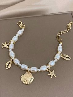 1pc Women's Simple And Fashionable Seashell Starfish Faux Pearl Bracelet For Daily Wear And Beach Yellow Gold    Zinc Alloy     Women Fashion Jewelry, size features are:Bust: ,Length: ,Sleeve Length: Sea Vibe, خواتم خطوبة, Surf Jewelry, Vacation Jewelry, Preppy Jewelry, Pretty Jewelry Necklaces, Faux Pearl Bracelet, Pearl Decor, Beads Bracelet Design