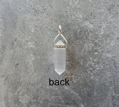 "Genuine selenite necklace. Selenite point pendant set in sterling silver hanging from a sterling silver chain in the style and length of your choice. Such a great layering necklace. Selenite is a white almost translucent stone that is also very reflective! Item description: Stone: Selenite Metal: Sterling Silver Shape: Point Size: Size: 1 1/4\"-1 3/8\" long and 1/4\"-3/8\" wide (approximate) Chain: Cable, Satellite, Open Link, Box - Cords: Braided Leather, Satin or Leather Length: 16\" to 36\" Minimalist White Quartz Crystal Necklace, White Quartz Pendant Crystal Necklaces, Selenite Jewelry, Selenite Necklace, Protection Necklace, Layering Necklace, Braided Leather, Healing Crystal, Pendant Set