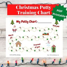 christmas potty training chart is shown on a table