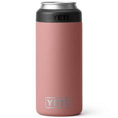 yeti insulated stainless steel can cooler in pink with the yeti logo on it