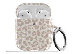 an animal print case with two airpods attached to it