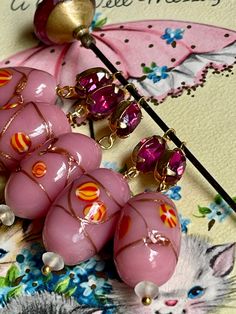 "This listing is for a set of beautiful glass drops that were assembled with components from a vintage necklace. The beads are glass and the pink rhinestone is glass as well. Quantity: 5 Size: 2 1/2\" long 🌺 Click here to return to my shop:  https://www.etsy.com/shop/VintageRoseFindings 🌸 favorite our shop for updates  🌿Instagram@vintagerosefindings (copy and paste link) 🌸Please visit my our other shop where we sell finished jewelry: https://www.etsy.com/shop/NellieGray" Pink Glass Jewelry With Faceted Beads, Handmade Pink Drop Necklaces, Pink Glass Jewelry For Jewelry Making, Pink Jewelry With Dangling Beads For Celebration, Pink Large Bead Dangle Earrings, Vintage Pink Czech Glass Jewelry, Pink Dangle Earrings With Large Beads, Pink Czech Glass Jewelry For Party, Pink Czech Glass Party Jewelry