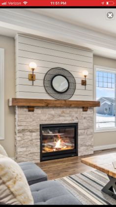 the living room is clean and ready for us to use in wintertime, while the fireplace has been painted white