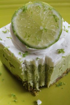 there is a piece of cake with lime on top