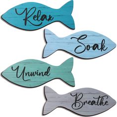 three wooden signs that say relax, soak, and swim with fish on them