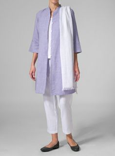 Light, lovely and simple, this long cut blouse is sure to delight your feminine side. Short Sleeve Linen Blouse For Layering, Linen Short Sleeve Blouse For Layering, Chic Linen Blouse For Layering, Linen Blouse For Layering With Short Sleeves, Elegant Linen Tops For Layering, White Long Sleeve Blouse For Casual Gatherings, Spring Linen Blouse For Layering, Chic Linen Tunic Blouse, Spring Linen Tunic For Layering