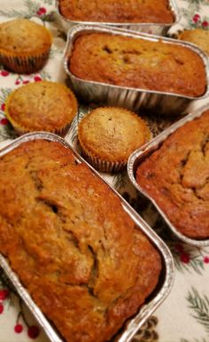 several muffins sitting in metal pans on a table