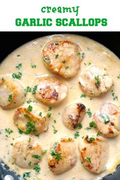 creamy garlic scallops in a skillet with parsley garnish on top