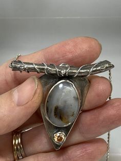 This pendant is nature-inspired. The Montana agate was pulled directly from the Yellowstone River in Montana.