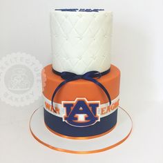 a cake with an auburn logo on it