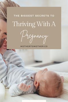 a mother holding her baby on the bed with text overlay that reads, the biggest secrets to thriving with a pregnant