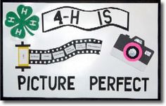 a sign that says, 4 - h is picture perfect with a camera and four leaf clover