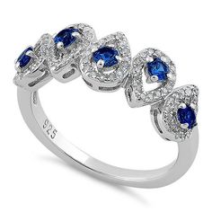 Top of ring height: 7.4mm

Top of ring width: 20.9mm

Band width: 2.3mm

Shank width: 2mm



Stone material: blue & clear cubic zirconia

Stone shape: round

Total number of CZ stones: 85

Stone setting: prong setting



Metal: 925 sterling silver

Plating: rhodium plated

Finish: high polish Blue Cubic Zirconia Birthstone Promise Ring, Blue Cubic Zirconia Rings With Diamond Accents, Blue Cubic Zirconia Cluster Ring Round Cut, Blue Cubic Zirconia Cluster Ring With Brilliant Cut, Blue Brilliant Cut Cubic Zirconia Cluster Ring, Sapphire Cluster Ring With Cubic Zirconia In Round Cut, Sapphire Cubic Zirconia Cluster Ring For Promise, Blue Cubic Zirconia Promise Ring, Blue Cubic Zirconia Diamond Ring With Prong Setting