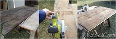 a person using a power tool to attach a piece of wood on top of a table