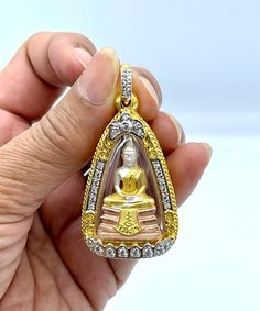 Handmade item from Thailand Handcrafted Bracelet Thai Gold Jewelry Designs Thai Buddha Amulet With Case Yellow Gold Plated &Gemstone: Cubic zirconia size :4.5 cm. x 3 cm. x 1.cm. (Approx.) Weight 24 Gram Materials: Brass Real 18k 24K Yellow and White gold plated/Nickel free FREE JEWELRY BAG WITH EVERY ITEM Description All gold plated jewelry was sent directly to us from the manufacturer in Bangkok This Unique Jewelry Is Brass Coated With Pure Gold Looks Just Like Solid Gold This purity (96.5%) i Thai Buddha, Talisman Pendant, Mens Gold Jewelry, Real Gold Jewelry, Handcrafted Bracelets, Cz Jewelry, Gold Jewellery Design, Pure Gold, Jewelry Bags