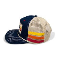 This throwback style hearkens back to the 70’s when trucker hats were first making their way into American culture. It features a heavy duty constructed cotton twill crown, soft vintage mesh, and sewn fabric bands on each side, a slightly curved bill, and adjustable snapback. ------------------------------------------ SHAPE --- MidProfile BRIM --- Precurved CLOSURE --- Snapback BACK --- Mesh Back FIT & SIZE --- One Size Fits Most Adults ------------------------------------------ #HARANV Colorado Hat, Kids Totes, Hat Base, Vintage Trucker Hats, Side A, American Culture, Market Tote, Retro Look, Gift Accessories