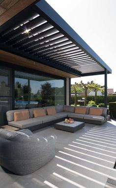 a large couch sitting on top of a patio