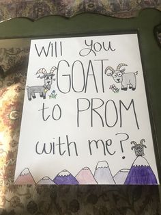 a sign that says, will you goat to prom with me?