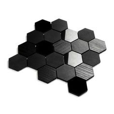 black and silver hexagonal tiles on a white background