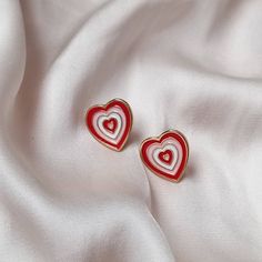 Don't miss out on this beautiful gold plated and pink retro heart stud earrings. They work with a large variety of looks and add a bit of sparkle to your outfit. MORE jewellery pieces avaliable on our shop! Any questions please message we are happy to help. Free postage in UK Thank you for shopping with us Heather&Bumble 📪Follow us at: Instagram: heatherandbumble Twitter: Heather_Bumble Pintrest: Heather & Bumble Pink & Gold Retro Heart Stud Earrings -  Pink 70's Style Earrings,Vintage Style,Pink Jewellery,Gold Earrings,Gold Heart Stud Earrings Heart-shaped Clip-on Earrings For Valentine's Day, Heart-shaped Clip-on Earrings For Valentine's Day Anniversary, Valentine's Day Heart Shaped Clip-on Earrings For Anniversary, Valentine's Day Heart Shaped Clip-on Earrings, Retro White Earrings For Gift, Vintage Red Heart Earrings For Pierced Ears, Red Vintage Heart Earrings, Vintage Heart Charm Earrings For Valentine's Day, Trendy Heart Earrings For Valentine's Day Anniversary