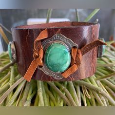 Beautiful Broken Arrow Variscite Brown Leather Cuff. Southwestern Style. Hasn’t Been Worn So Leather Is Stiff And Will Only Soften And Get Better With Age Once Worn. 3 Gorgeous Green Stones. Maker Is Deb Scialla Of Lost Pond Studios. She Has Been Written Up In Cowgirl Magazine In The Past. 2 Snap Closure And Will Fit A 6.5 Or 7” Wrist. Width Is 1.5”. All Handmade. Came Directly From Maker With No Tags. Excellent Brand New Condition. Southwestern Adjustable Leather Cuff Bracelet, Adjustable Southwestern Leather Cuff Bracelet, Bohemian Leather Cuff Bracelet, Southwestern Brown Bracelets, Unique Leather Cuff Bracelet, Southwestern Leather Concho Cuff Bracelet, Cowgirl Magazine, Studio Green, Broken Arrow