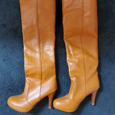 Orange Boots Never Worn Retro Spring Heeled Boots, Retro Fitted Heeled Boots For Spring, Retro Style Fitted Heeled Boots For Spring, Retro Synthetic Heels For Fall, Retro Synthetic Boots For Fall, Fitted Orange Boots For Fall, Fergie Boots, Brown Vintage Boots, Red Heel Boots