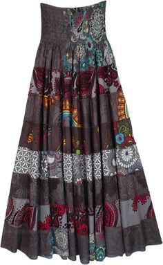 A two-in-one skirt that can be dressed as both a skirt and a dress with mixed floral, abstract and ethnic prints.  The skirt has a tiered construction and a great fall. #tlb #TieredSkirt #vacationclothing #beachwrap #Floral #Printed #bohemianfashion #Tieredskirt #Smockedskirt #Rayonskirt #Skirtdress Bohemian Tiered Multicolor Skirt, Brown Patchwork Tiered Skirt, Multicolor Tiered Gathered Skirt Dress, Multicolor Tiered Dress With Gathered Skirt, Multicolor Tiered Skirt With Floral Print, Multicolor Tiered Lined Skirt, Eclectic Townhouse, Whimsigoth Style, Trippy Clothes