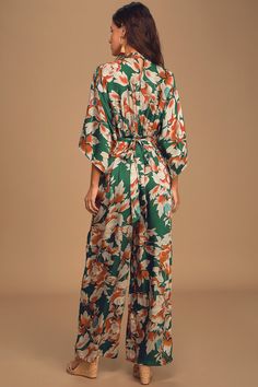 Beach Floral Print Stretch Jumpsuits And Rompers, Chic Green Jumpsuit With Elastic Waistband, Green Floral Print Jumpsuits And Rompers For Brunch, Green Jumpsuits And Rompers With Elastic Waistband For Spring, Green Floral Print Jumpsuit For Brunch, Fitted Floral Print Tropical Jumpsuit, Tropical Floral Print Sleeveless Jumpsuit, Printed Tropical V-neck Jumpsuits And Rompers, Casual Tropical Print V-neck Jumpsuits And Rompers