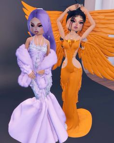 two very pretty dolls with big wings on them