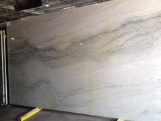 a large white marble slab in a warehouse