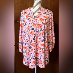 Features: 3/4 Length Sleeves, Wrinkle Free And V-Neckline Materials: 94% Polyester 6% Spandex Brand: Dear Scarlett Size: Xl: Chest 46" Length 29” Pink Relaxed Fit Top With 3/4 Sleeves, Pink 3/4 Sleeve Tops For Spring, Pink Floral Print Top With 3/4 Sleeves, Pink Floral Print Tops With 3/4 Sleeves, Pink 3/4 Sleeve Blouse For Brunch, Pink Blouse With 3/4 Sleeves For Brunch, Garment Bags, Wrinkle Free, Orange Pink